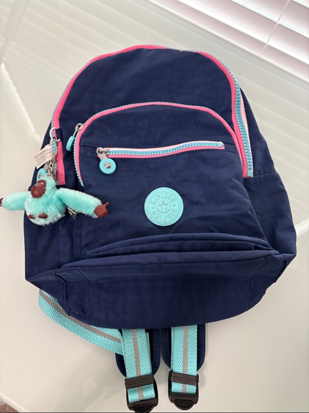 Kipling Seoul Small BTS Tablet Backpack in Navy Pink & Aqua Accents